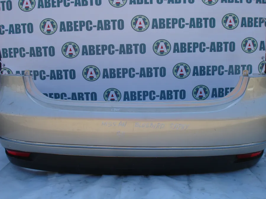 Бампер задний Nissan Bluebird Sylphy G11 серебро