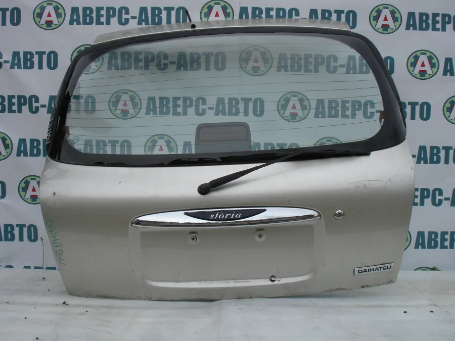 Дверь багажника Toyota Duet M100A серебро