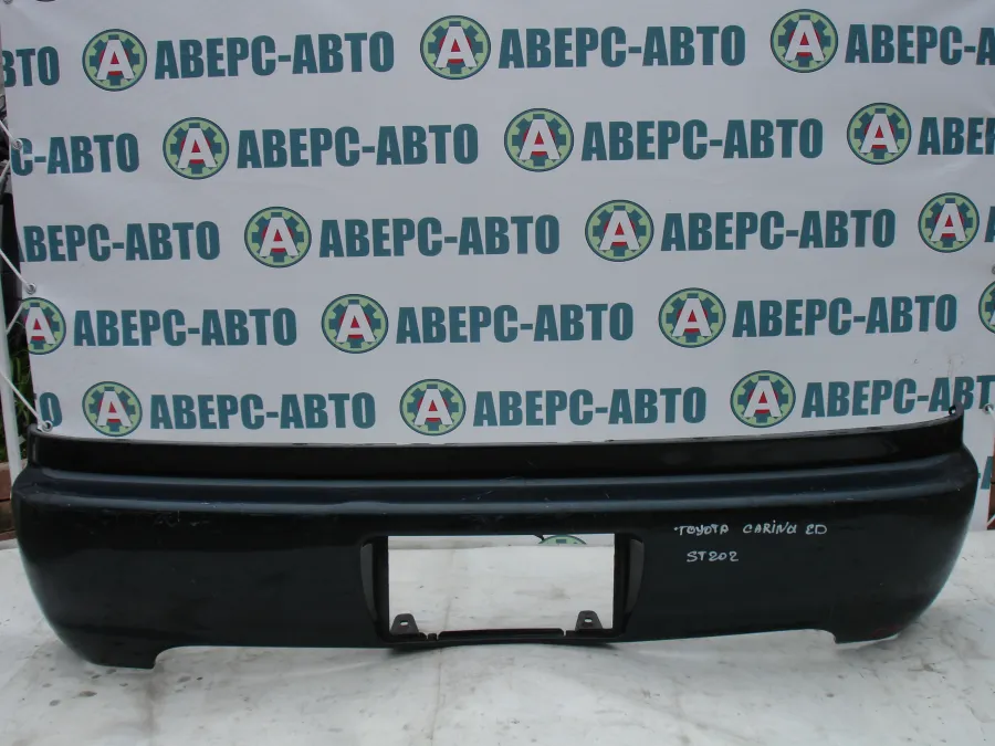 Бампер задний Toyota Carina ED ST202 черный