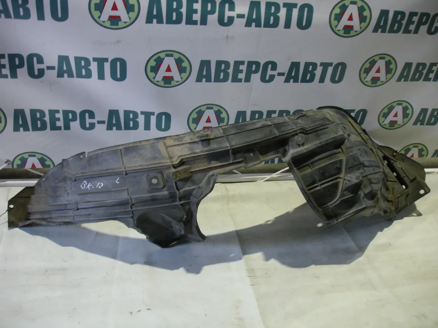 Подкрылок левый передний Nissan March AK12