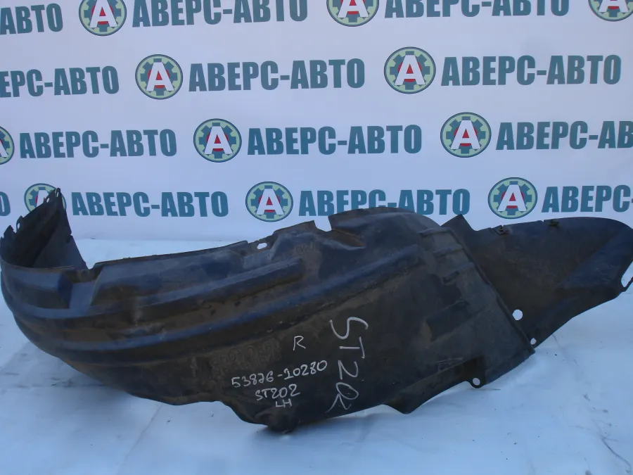 Подкрылок передний левый Toyota Carina ED ST202