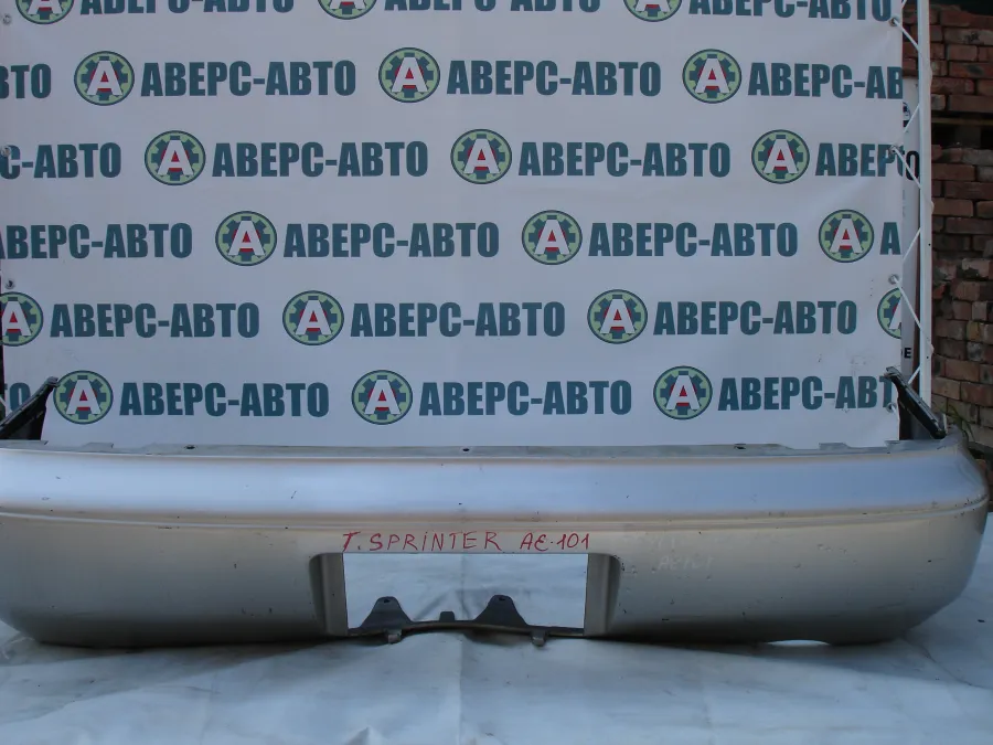 Бампер задний Toyota Sprinter AE101 серебро