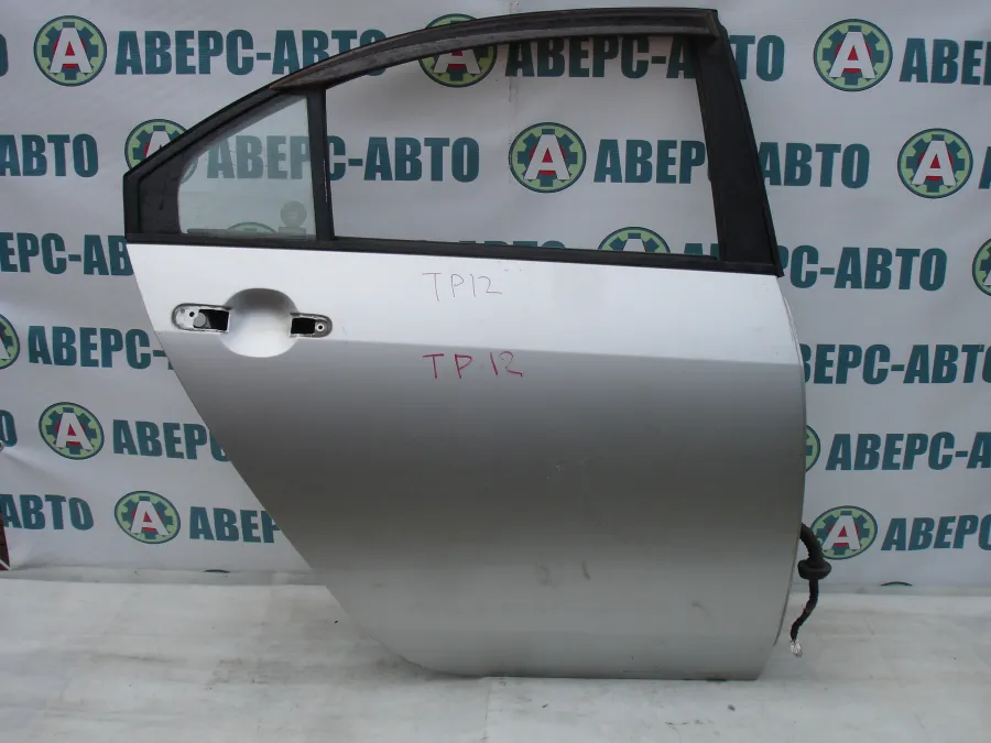 Дверь боковая правая задняя Nissan Primera TP12 серебро