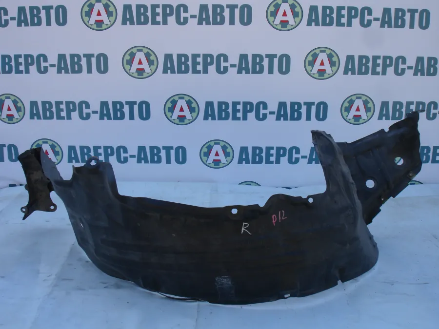 Подкрылок передний правый Nissan Primera TP12
