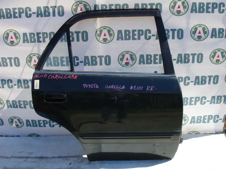 Дверь боковая задняя правая Toyota Corolla AE110 черная