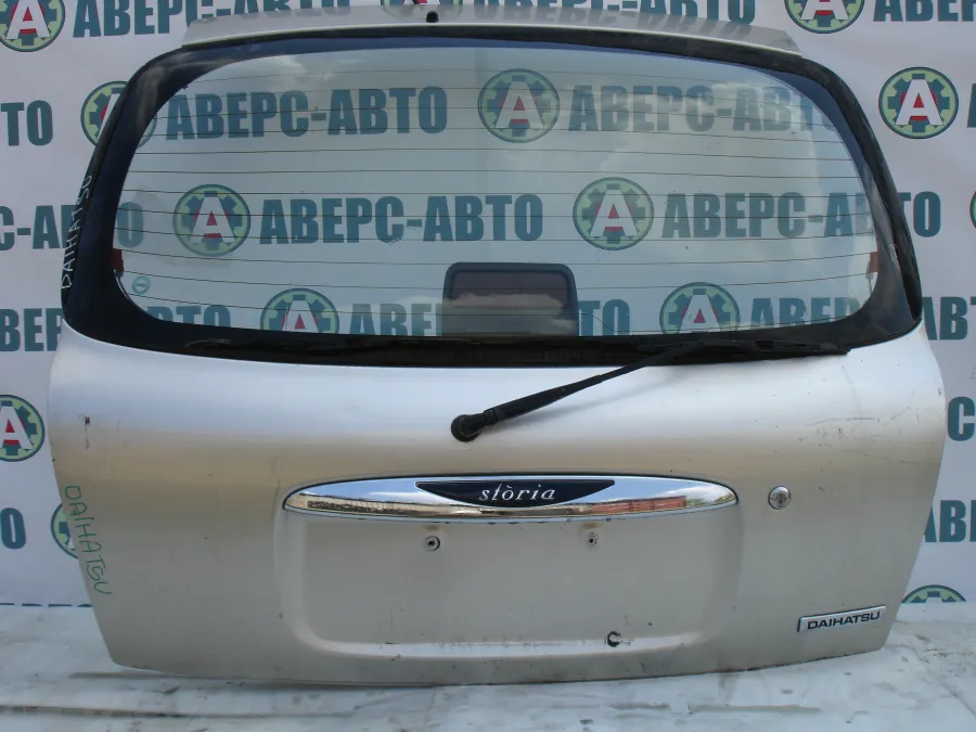 Дверь багажника Daihatsu Storia M101S серебро