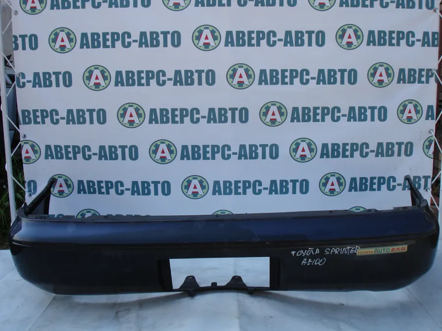 Бампер задний Toyota Sprinter AE100 черный