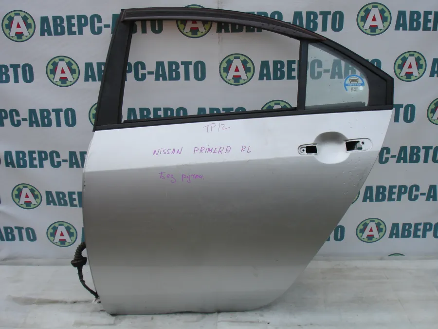 Дверь боковая левая задняя Nissan Primera TP12 серебро
