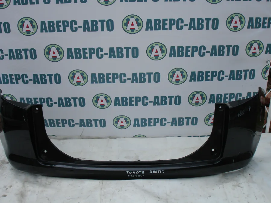 Бампер задний Toyota Ractis NCP100 черный