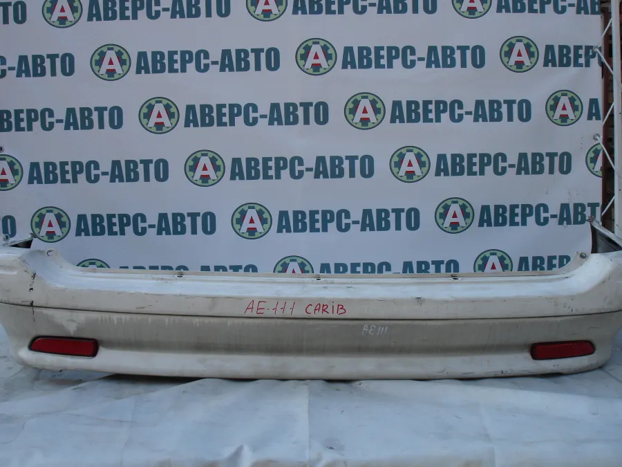 Бампер задний Toyota Sprinter Carib AE111G белый