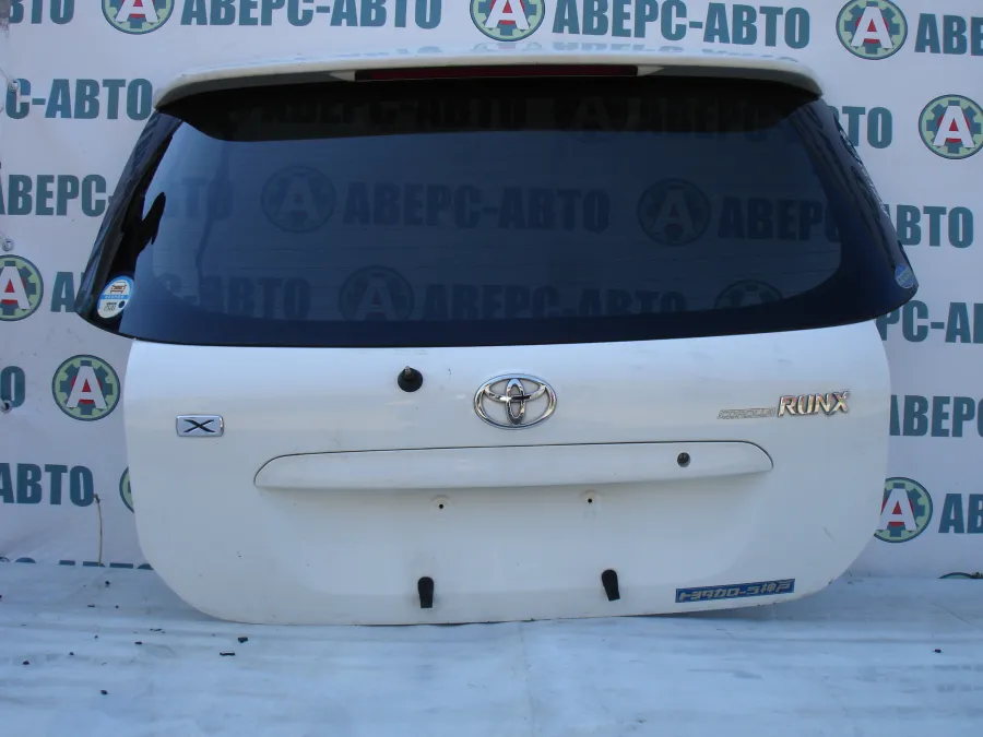 Дверь багажника Toyota Corolla Runx NZE121 белая