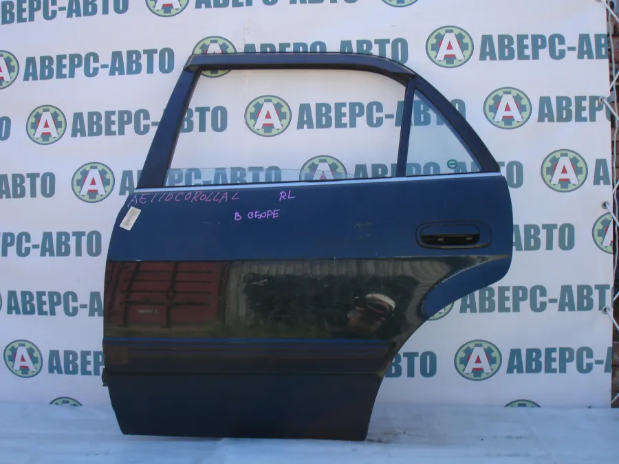 Дверь боковая левая задняя Toyota Corolla AE110 черная