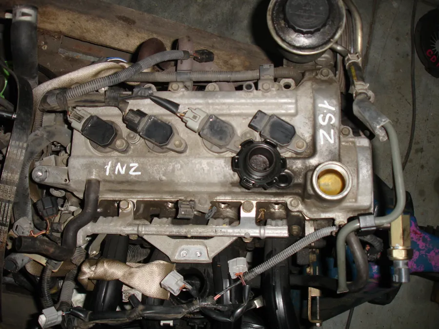 Двигатель Toyota Platz SCP11 1SZ-FE