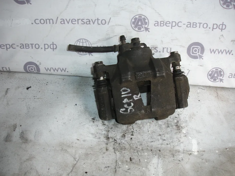 Суппорт Передний правый Toyota Vitz SCP10